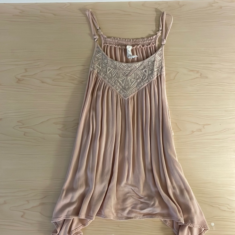 pink loose fit tank top with embroidery at the top